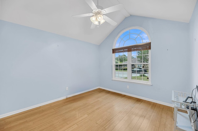 1309 Llewellyn Rd, Mount Pleasant, SC 29464 - empty room with a ceiling fan, light wood-style flooring, lofted ceiling, and baseboards