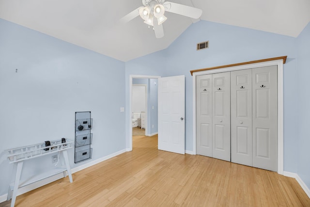1309 Llewellyn Rd, Mount Pleasant, SC 29464 - unfurnished bedroom featuring light wood-type flooring, baseboards, high vaulted ceiling, ceiling fan, and a closet