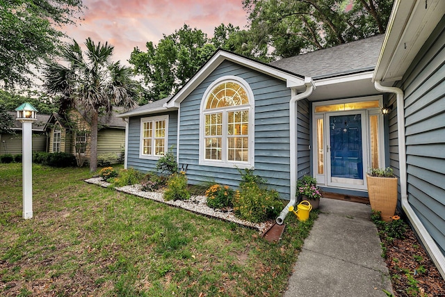 1309 Llewellyn Rd, Mount Pleasant, SC 29464 - view of exterior entry featuring a lawn