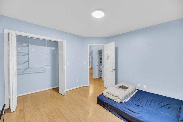 1309 Llewellyn Rd, Mount Pleasant, SC 29464 - unfurnished bedroom featuring wood finished floors, baseboards, and a closet