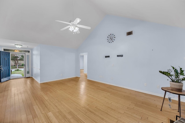 1309 Llewellyn Rd, Mount Pleasant, SC 29464 - unfurnished living room with high vaulted ceiling, ceiling fan, baseboards, and light wood-style flooring