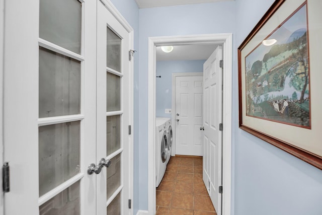 1309 Llewellyn Rd, Mount Pleasant, SC 29464 - laundry area featuring washer and dryer and dark tile patterned floors