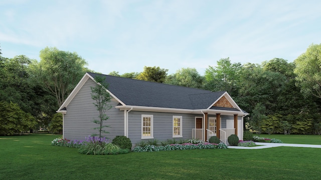 view of front of house with a front yard and a shingled roof