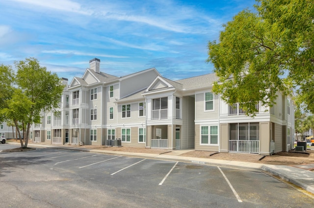 130 River Landing Dr Unit 9104, Charleston, SC 29492 - view of building exterior with uncovered parking