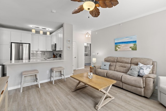 130 River Landing Dr Unit 9104, Charleston, SC 29492 - living room with ceiling fan, light wood-style floors, and ornamental molding