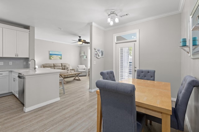 130 River Landing Dr Unit 9104, Charleston, SC 29492 - dining room featuring a ceiling fan, ornamental molding, and light wood-style flooring