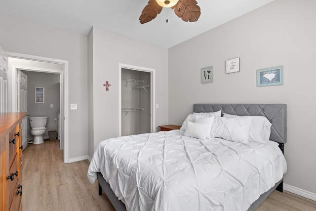 130 River Landing Dr Unit 9104, Charleston, SC 29492 - bedroom with light wood-style floors, a closet, a ceiling fan, and a walk in closet