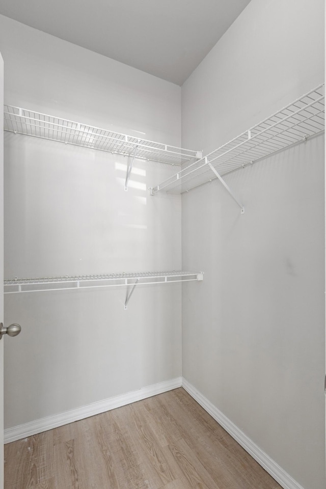 130 River Landing Dr Unit 9104, Charleston, SC 29492 - walk in closet featuring wood finished floors