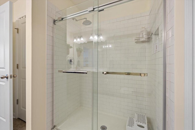 full bathroom with a shower stall