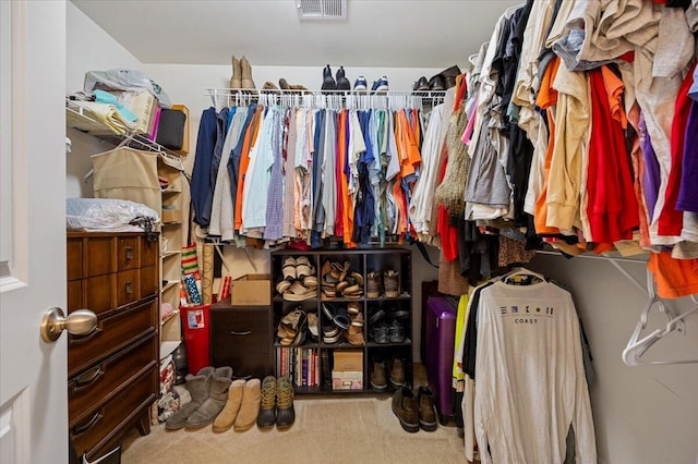 walk in closet featuring carpet and visible vents