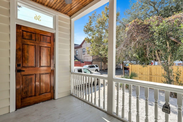 doorway to property featuring a porch