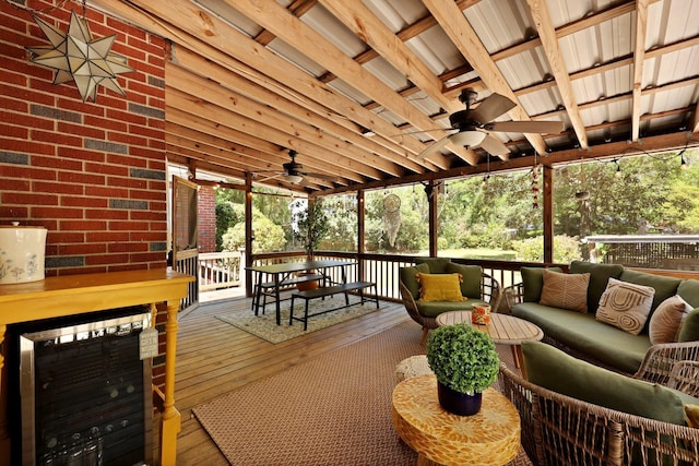 wooden terrace featuring an outdoor living space, ceiling fan, outdoor dining space, and wine cooler