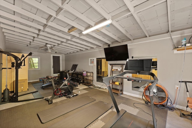 exercise room with baseboards