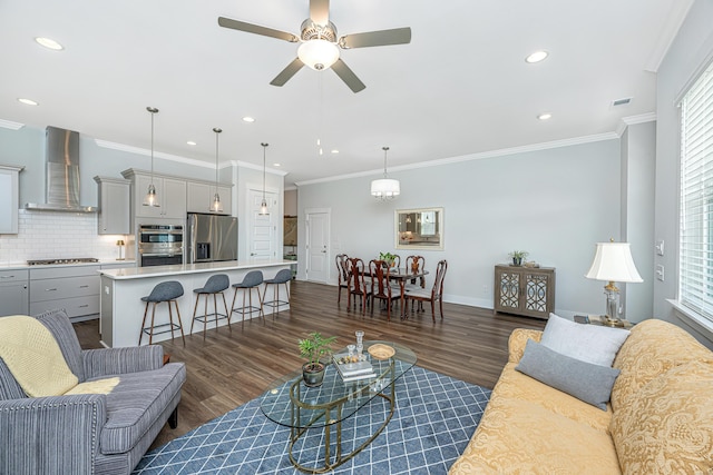 living room with visible vents, recessed lighting, ceiling fan, and dark wood finished floors