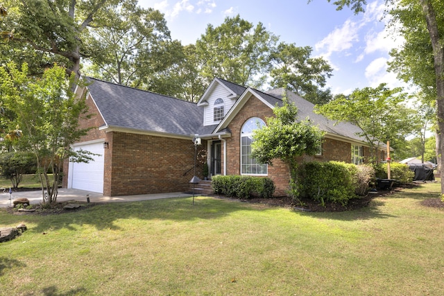 256 Ridge Lake Dr, Manning, SC 29102 - traditional home featuring brick siding, an attached garage, a shingled roof, and a front lawn