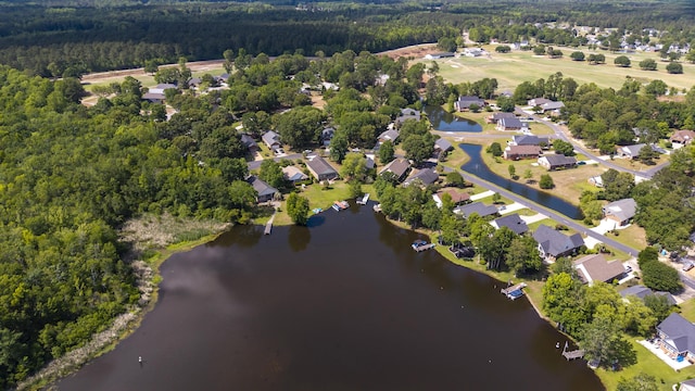 256 Ridge Lake Dr, Manning, SC 29102 - aerial view of property and surrounding area with a heavily wooded area and a nearby body of water