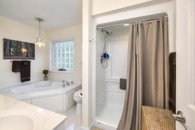 256 Ridge Lake Dr, Manning, SC 29102 - full bath featuring a shower stall, tile patterned floors, a garden tub, toilet, and a chandelier