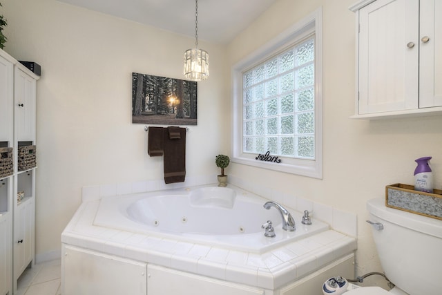 256 Ridge Lake Dr, Manning, SC 29102 - full bath with a jetted tub, toilet, a chandelier, and tile patterned floors