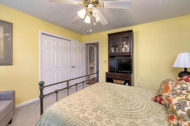 256 Ridge Lake Dr, Manning, SC 29102 - carpeted bedroom with a closet, a ceiling fan, and baseboards