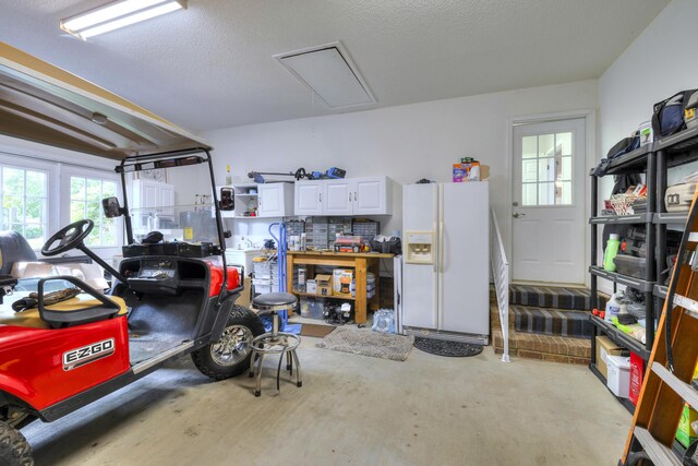 256 Ridge Lake Dr, Manning, SC 29102 - garage featuring white refrigerator with ice dispenser