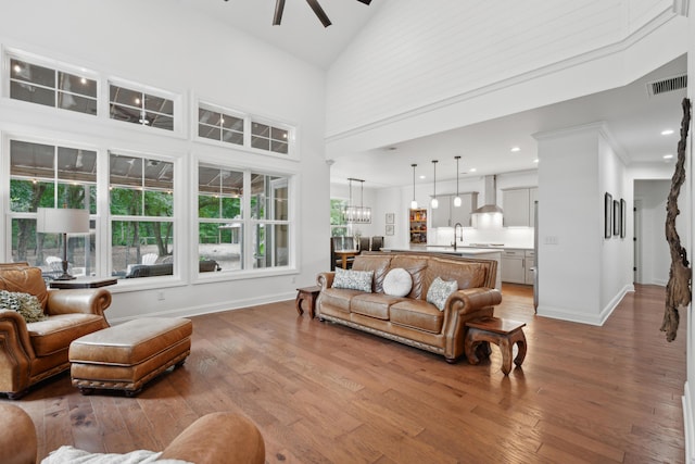 233 Camber Rd, Huger, SC 29450 - living room with ceiling fan, wood finished floors, and high vaulted ceiling