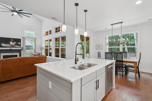 233 Camber Rd, Huger, SC 29450 - kitchen featuring dishwasher, hardwood / wood-style floors, open floor plan, a fireplace, and recessed lighting