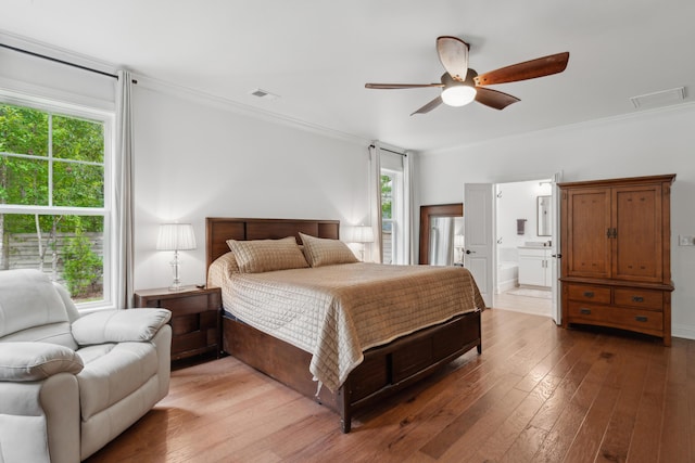 233 Camber Rd, Huger, SC 29450 - bedroom with hardwood / wood-style floors, ornamental molding, a ceiling fan, and ensuite bath