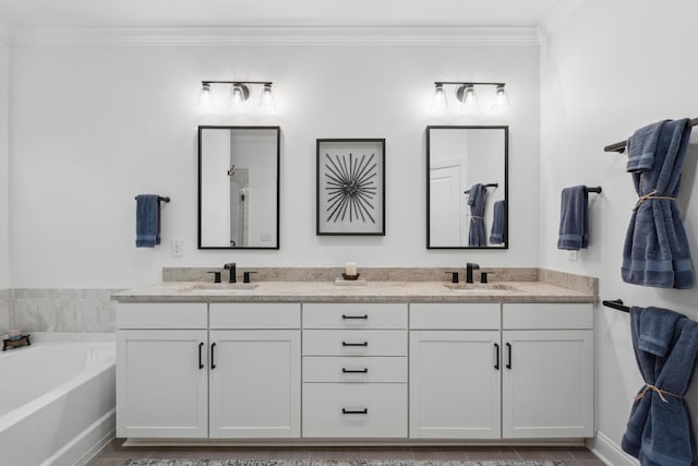 233 Camber Rd, Huger, SC 29450 - full bath featuring double vanity, a garden tub, ornamental molding, and a shower