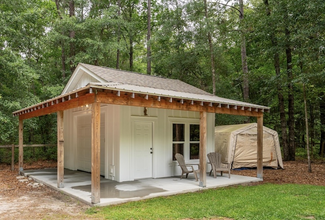 233 Camber Rd, Huger, SC 29450 - view of shed featuring a wooded view
