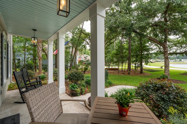 233 Camber Rd, Huger, SC 29450 - covered porch featuring a yard