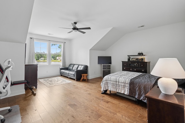 233 Camber Rd, Huger, SC 29450 - bedroom featuring wood finished floors, vaulted ceiling, and ceiling fan