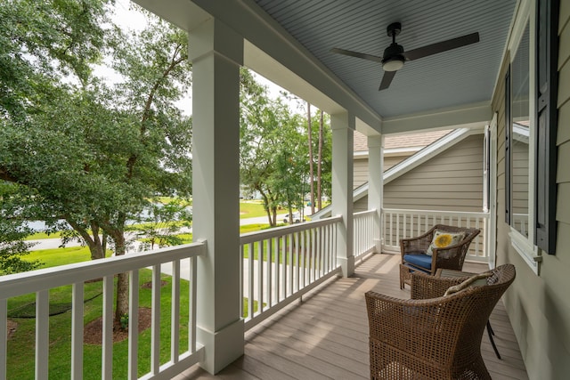 233 Camber Rd, Huger, SC 29450 - wooden porch featuring a ceiling fan