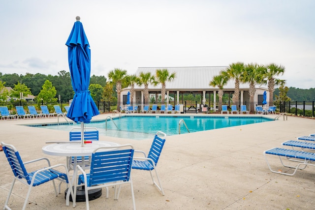 233 Camber Rd, Huger, SC 29450 - community pool featuring a patio
