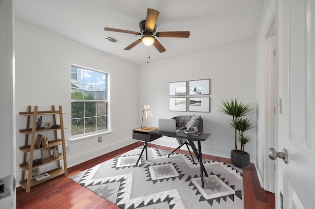 office area with ornamental molding, ceiling fan, and dark wood-type flooring