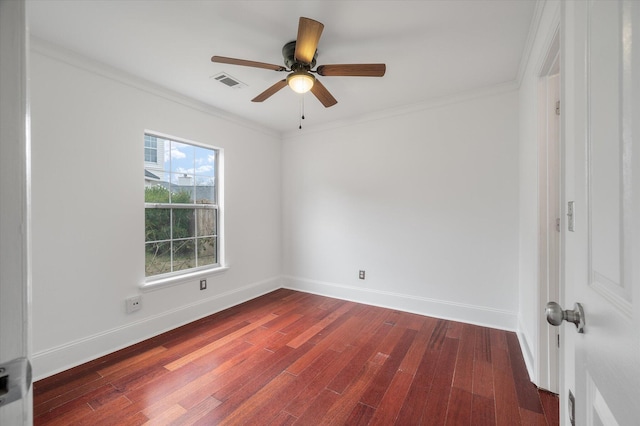 unfurnished room featuring dark hardwood / wood-style flooring, ceiling fan, and ornamental molding