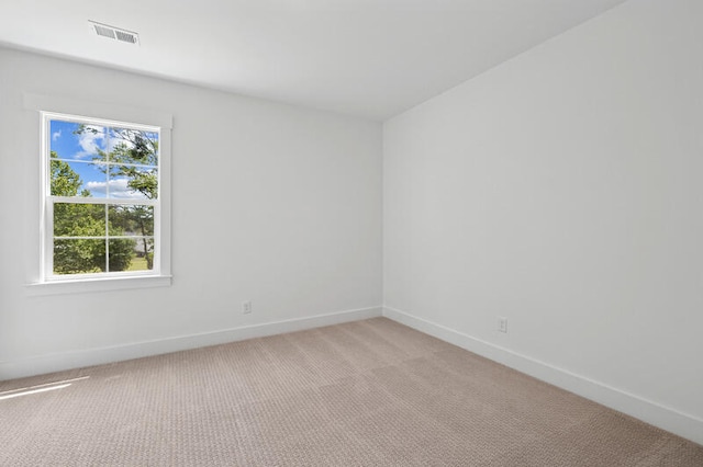 2027 Riverbend Dr, James Island, SC 29412 - spare room featuring light colored carpet and baseboards