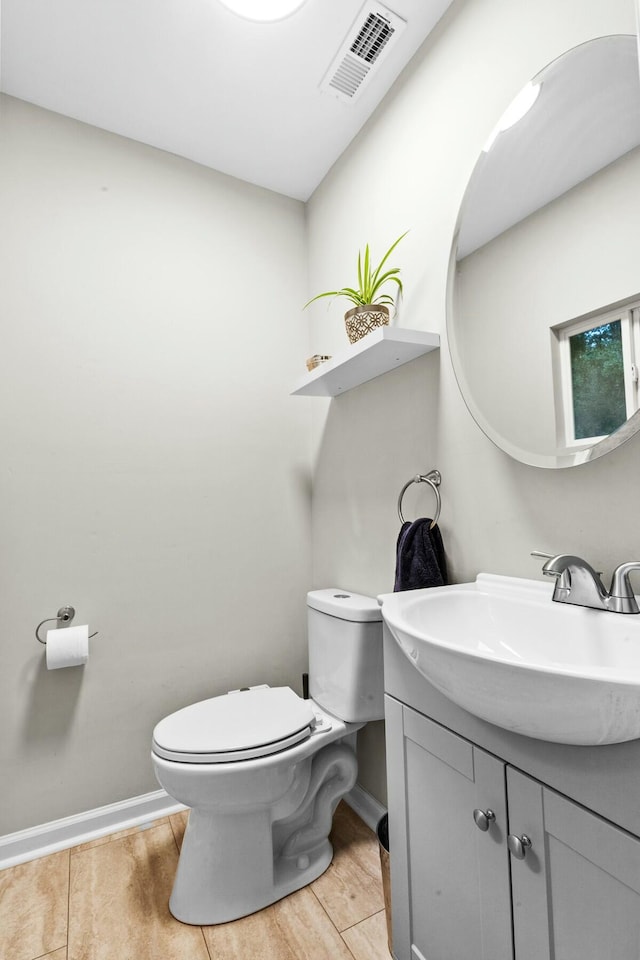 120 Lisa Dr, Summerville, SC 29485 - bathroom featuring toilet, vanity, visible vents, and baseboards