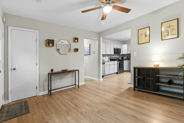 120 Lisa Dr, Summerville, SC 29485 - interior space featuring light wood finished floors, baseboards, and ceiling fan