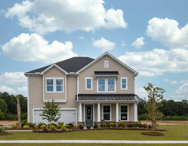 craftsman-style home featuring a front yard, a garage, and a porch