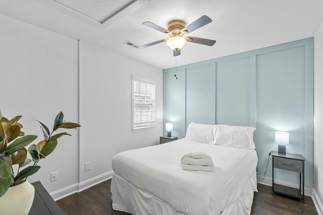 bedroom featuring dark wood-type flooring and ceiling fan