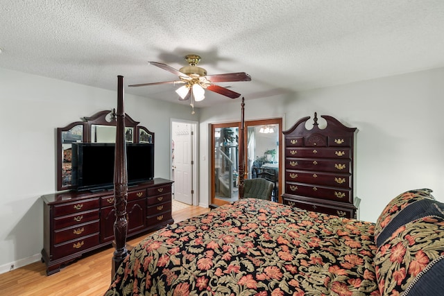 3347 Walter Dr, Johns Island, SC 29455 - bedroom with access to outside, light wood finished floors, ceiling fan, and a textured ceiling