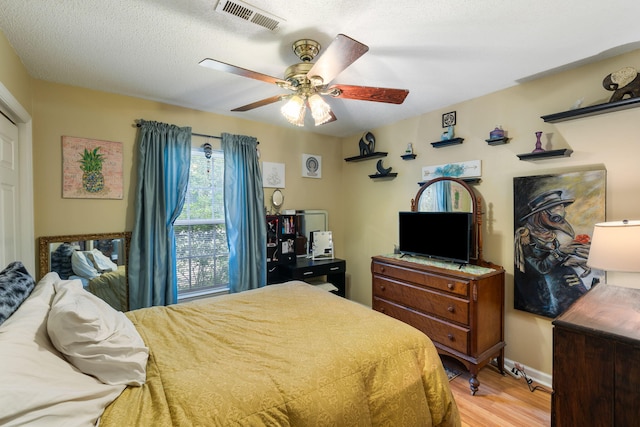 3347 Walter Dr, Johns Island, SC 29455 - bedroom featuring light wood-style flooring and a ceiling fan