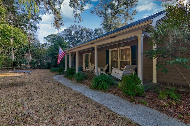 exterior space featuring covered porch