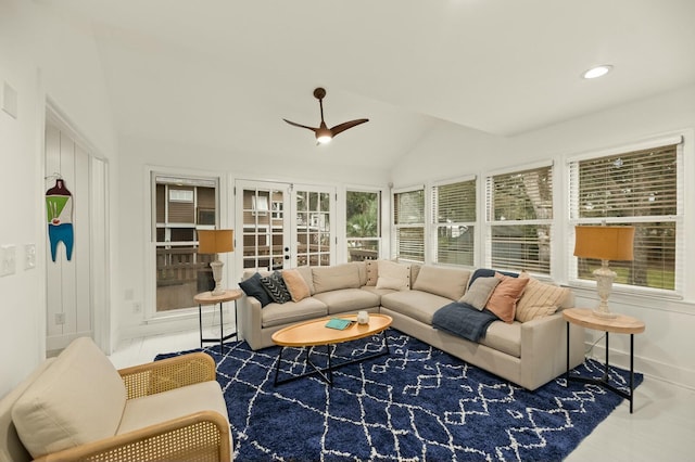 sunroom / solarium featuring french doors, vaulted ceiling, and ceiling fan