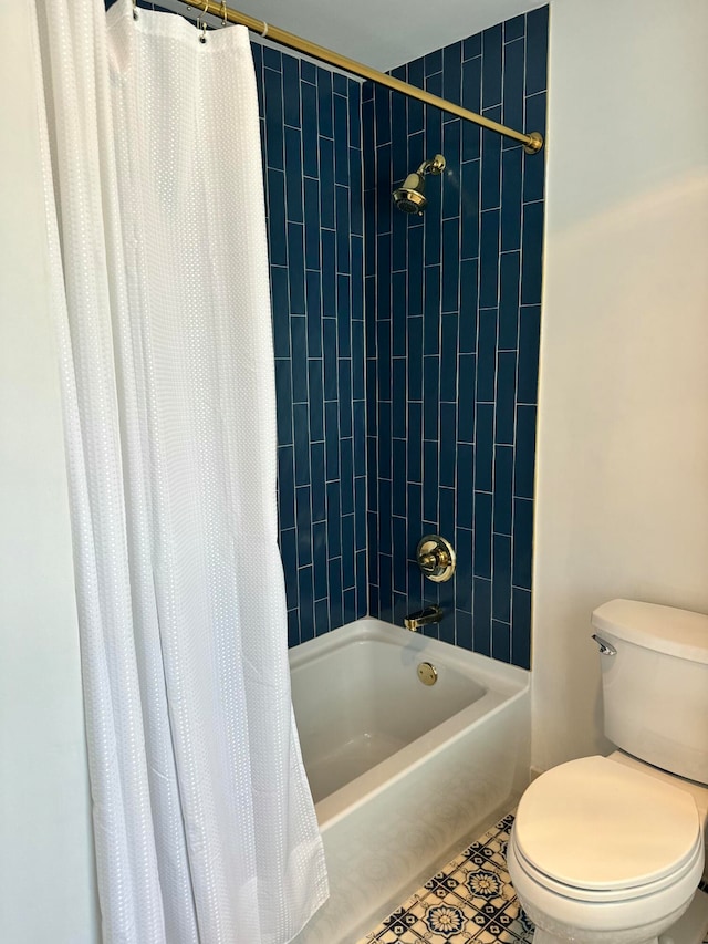 bathroom with shower / bath combo with shower curtain and toilet