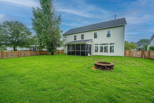468 Maple Oak Ln, Charleston, SC 29414 - back of house with an outdoor fire pit, a sunroom, and a fenced backyard