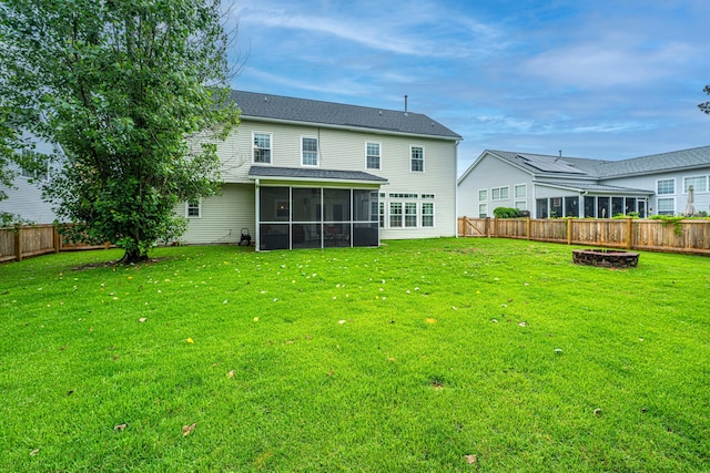 468 Maple Oak Ln, Charleston, SC 29414 - back of property featuring a sunroom, a fenced backyard, and a fire pit