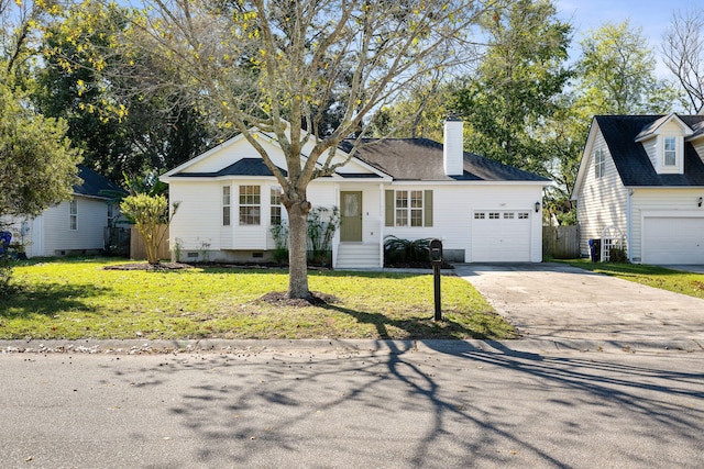 ranch-style house featuring an attached garage, a chimney, a front lawn, and concrete driveway