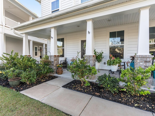 doorway to property featuring a porch