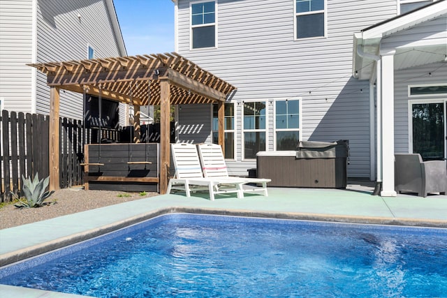 outdoor pool with a jacuzzi, a patio, fence, and a pergola